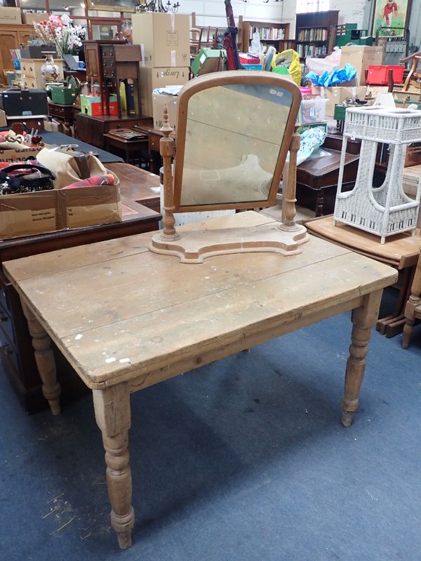 A VICTORIAN PINE KITCHEN TABLE