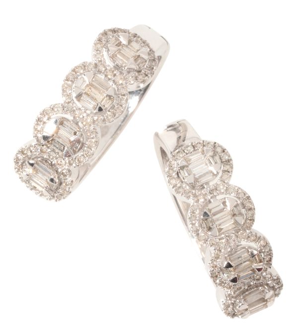 A PAIR OF DIAMOND HOOP EARRINGS