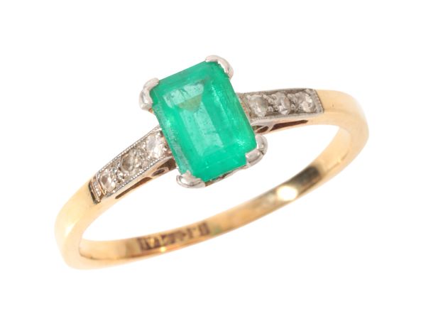 AN EMERALD AND DIAMOND RING