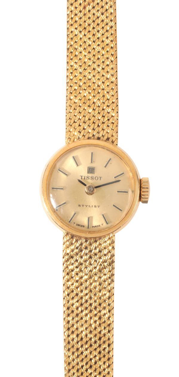 TISSOT 'STYLIST': A LADY'S 18CT GOLD DRESS WATCH