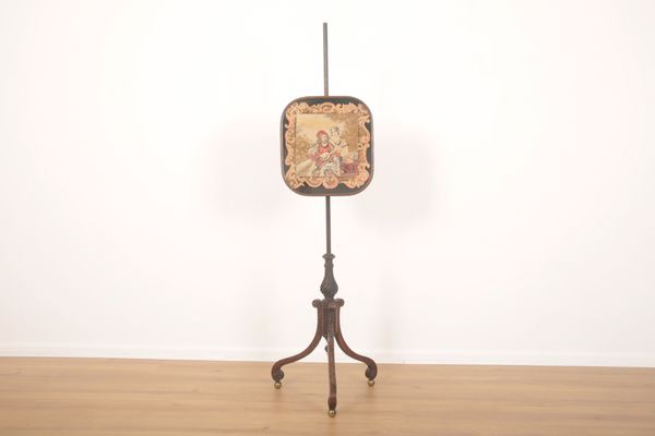 A REGENCY GRAINED WOOD AND GILT METAL MOUNTED POLE SCREEN