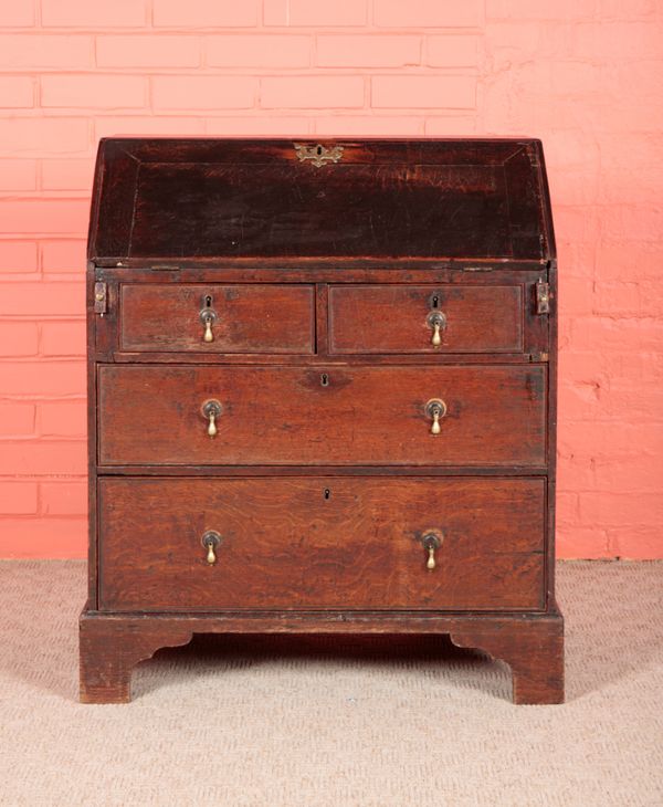 A GEORGE II OAK BUREAU