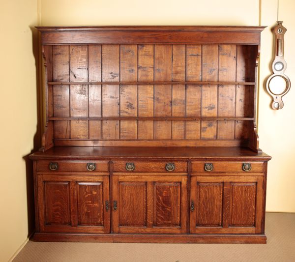 A LARGE OAK DRESSER