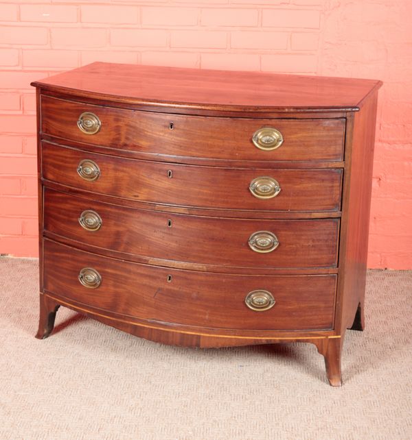 A REGENCY MAHOGANY BOW FRONT CHEST OF DRAWERS