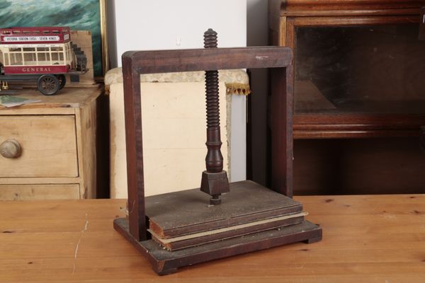 A 19TH CENTURY MAHOGANY BOOK PRESS