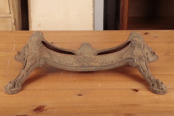 A LATE 19TH CENTURY YOUNG’S PATENT RADIAL CAST IRON BICYCLE STAND