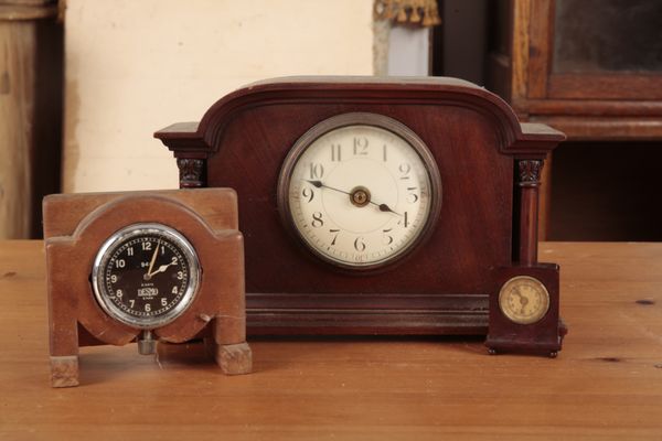 AN EDWARDIAN MAHOGANY MANTEL CLOCK
