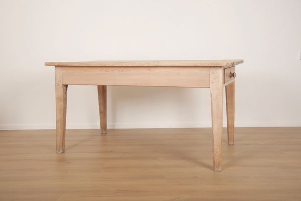 A VICTORIAN PINE KITCHEN TABLE