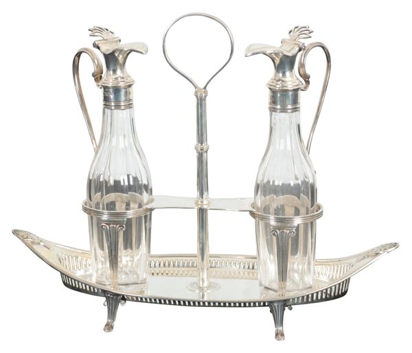 A LATE VICTORIAN SILVER ‘CLASSICAL REVIVAL’ TWO BOTTLE CRUET