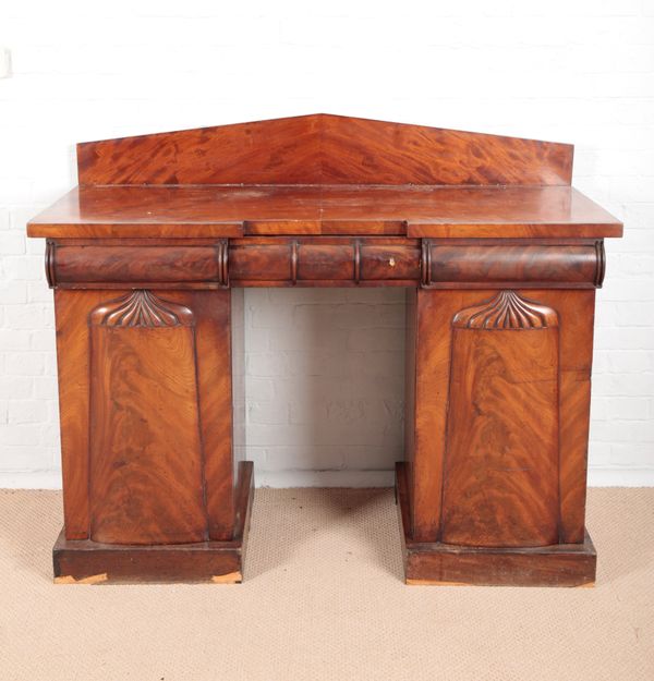 AN EARLY VICTORIAN FIGURED MAHOGANY SIDEBOARD