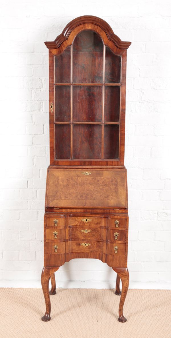 A 1920’S FIGURED WALNUT QUEEN ANNE STYLE BUREAU BOOKCASE