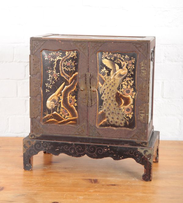 A JAPANESE METAL BOUND LACQUERED TABLE CABINET