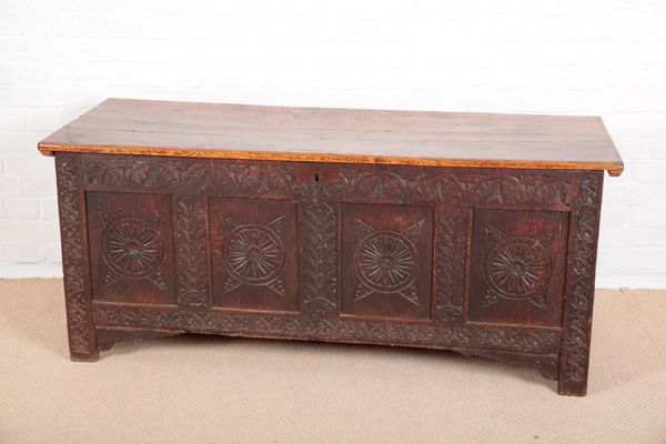 A PANELLED OAK COFFER