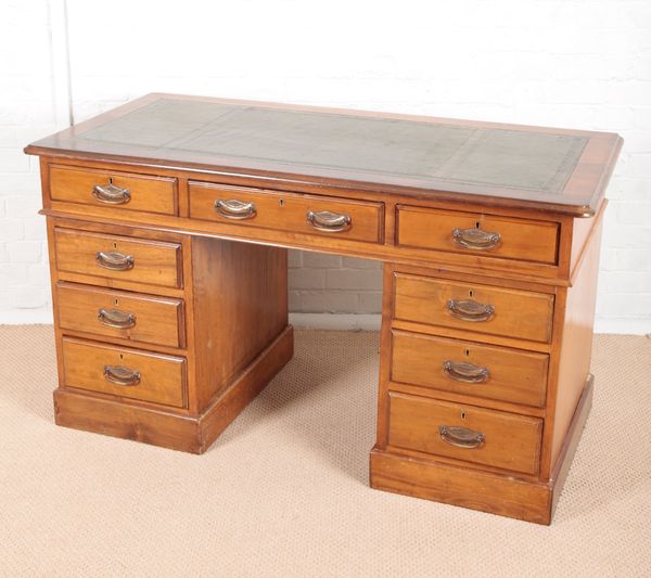 A LATE VICTORIAN STAINED DEAL AND PINE KNEEHOLE DESK