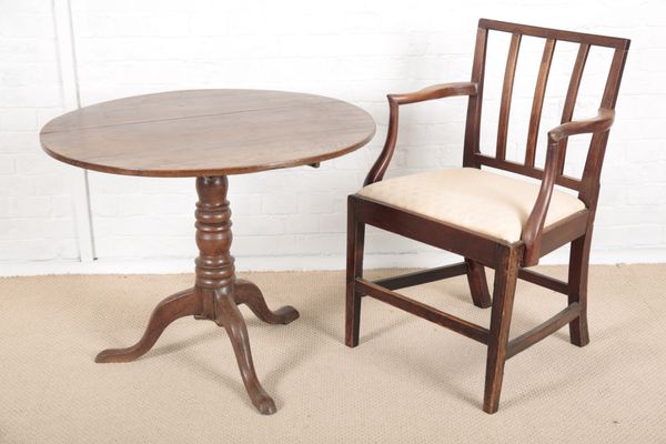 A GEORGE III ELM CIRCULAR TRIPOD TABLE