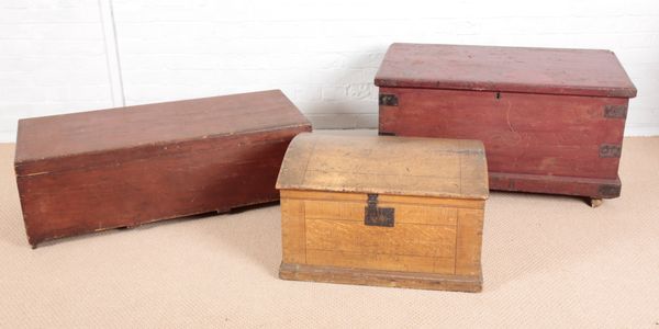 A GRAINED PINE DOMED TOP TRUNK