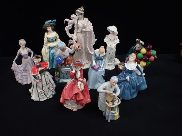 A COLLECTION OF CERAMIC FIGURES