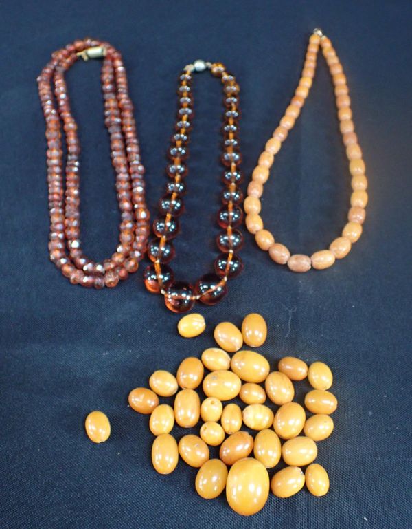 THREE AMBER NECKLACES