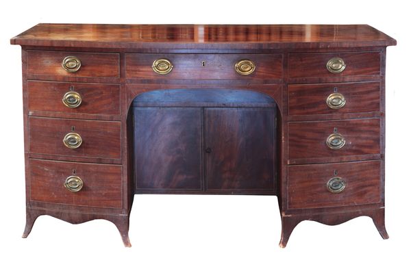 A REGENCY MAHOGANY BOWFRONT SIDEBOARD