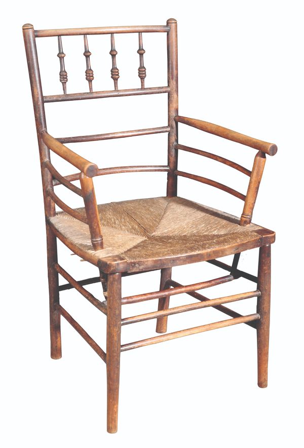 AFTER WILLIAM MORRIS (1834-96) AN ARTS AND CRAFTS 'SUSSEX' OPEN ARMCHAIR