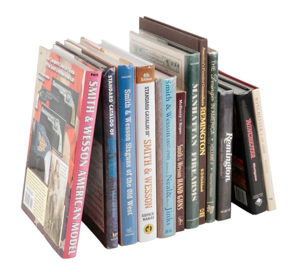 A QUANTITY OF BOOKS ON SMITH & WESSON AND WINCHESTER GUNS