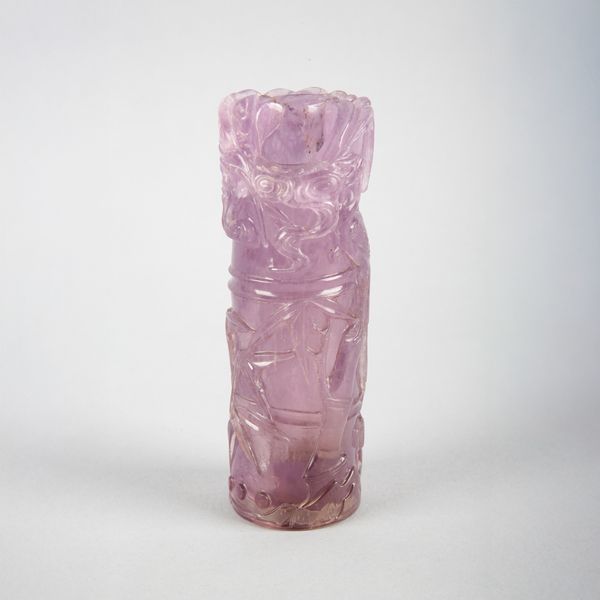 A CHINESE CARVED AMETHYST BRUSH POT