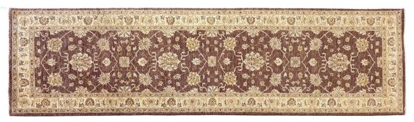 A PERSIAN RUNNER BY THE 'LONDON PERSIAN RUG COMPANY'