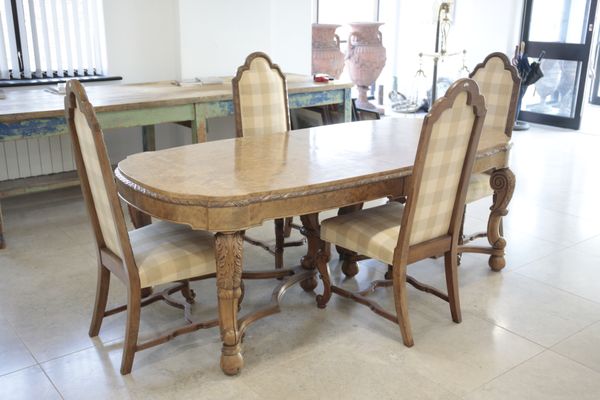 A HILLE OF LONDON BURR WALNUT DINING SUITE IN BAROQUE STYLE