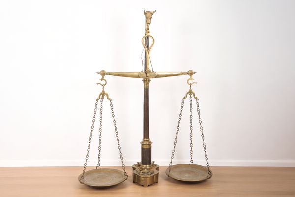 A SET OF FLOOR STANDING GIANT BRASS BUTCHER'S SCALES