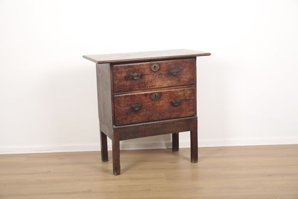 A PROVINCIAL CHEST OF DRAWERS