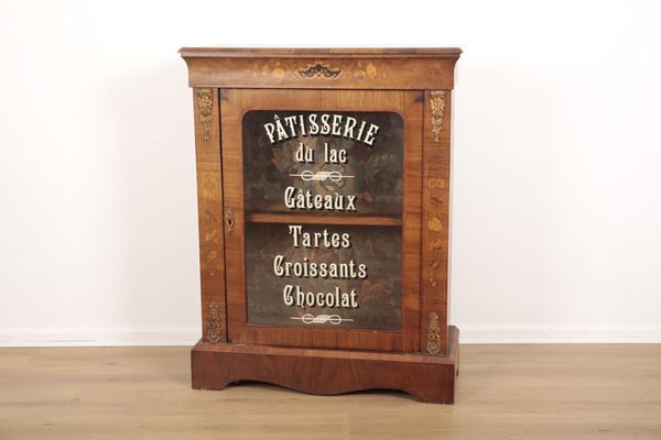 A VICTORIAN WALNUT PIER CABINET