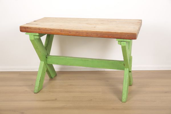 A GREEN-PAINTED KITCHEN TABLE
