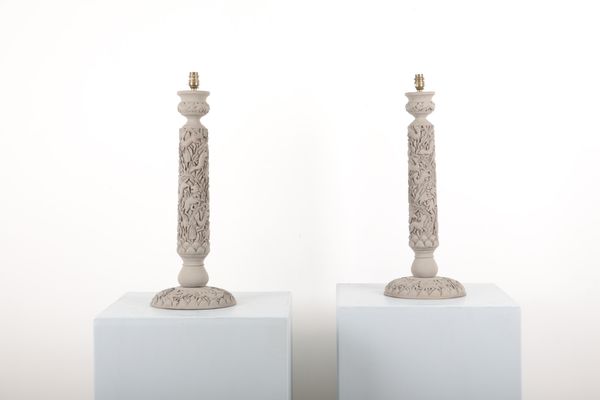A PAIR OF CARVED GREY-PAINTED COLUMN LAMPS