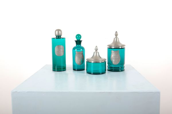 A TEAL GLASS AND WHITE METAL FOUR-PIECE FRENCH VANITY SET BY L'ETAIN A LA ROSE