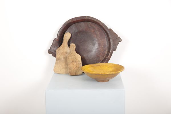 A CARVED OAK DOUGH KNEADING BOWL