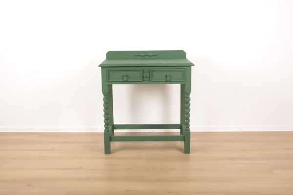 A MAPLE & CO. GREEN PAINTED OAK AND PINE TABLE