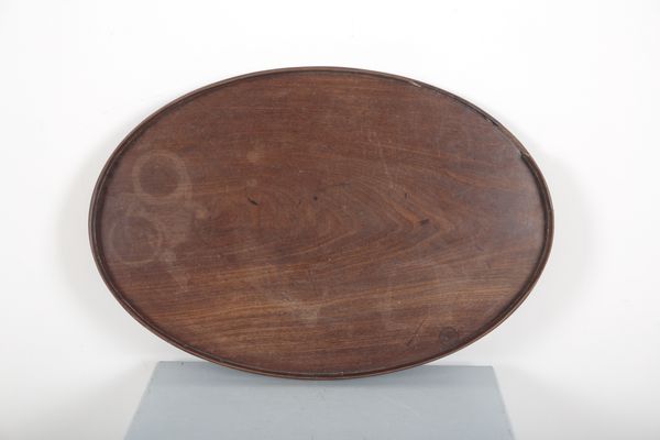 A GEORGE III MAHOGANY OVAL TRAY