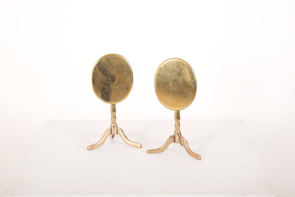 A PAIR OF BRASS MINIATURE OVAL TRIPOD TABLES