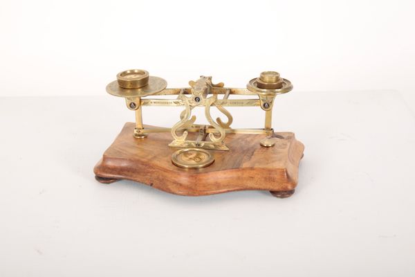 A SET OF VICTORIAN BRASS POSTAGE SCALES BY MORDAN & CO.