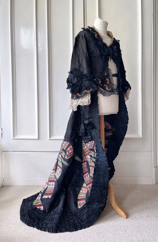 A VICTORIAN SILK BUSTLE DRESS
