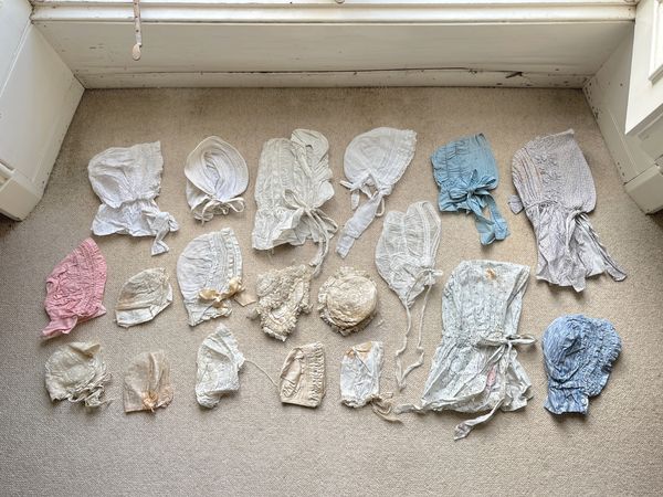 A LARGE QUANITITY OF WOMEN'S, CHILDREN'S AND INFANT BONNETS