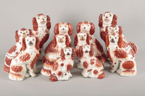 A LITTER OF 19TH CENTURY STAFFORDSHIRE POTTERY SPANIELS