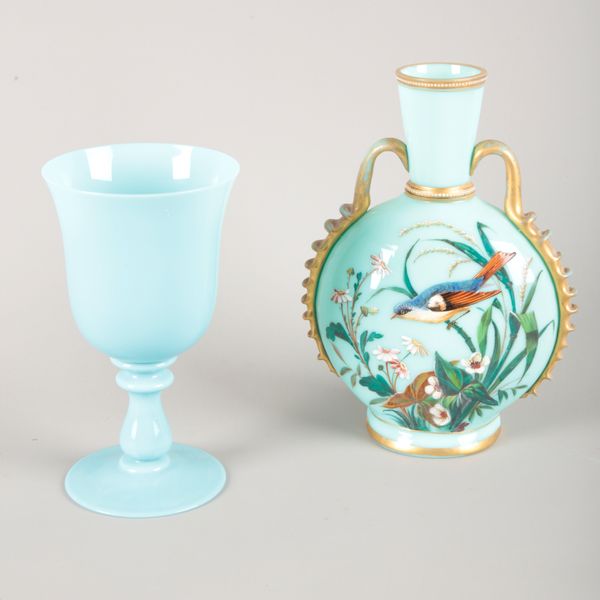 A VICTORIAN TURQUOISE GLASS TWO HANDLED VASE