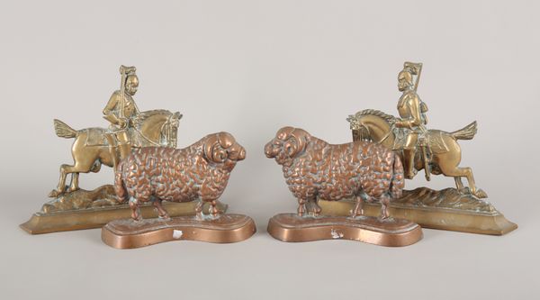 A PAIR OF 19TH CENTURY COPPER PRIZE RAM FIRESIDE PLAQUES