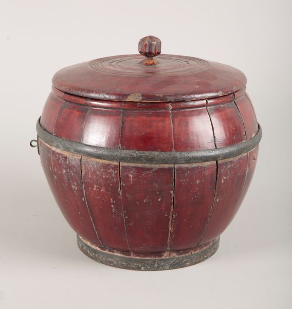 A CHINESE STAINED WOOD STORAGE VESSEL