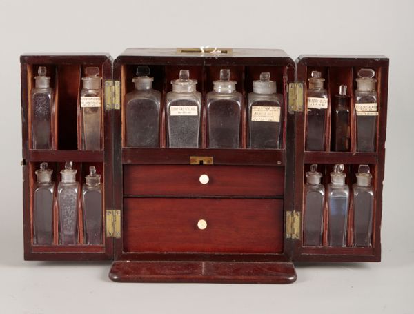 A MAHOGANY APOTHECARY CABINET