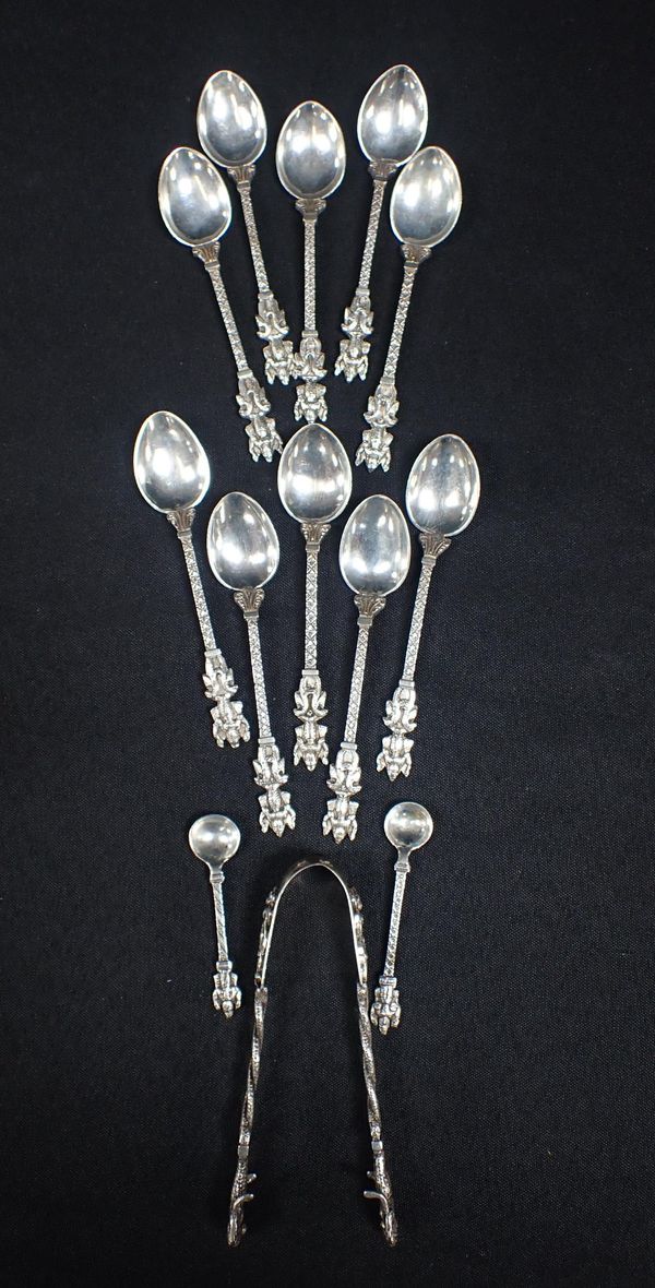 A SET OF INDIAN WHITE METAL TEASPOONS