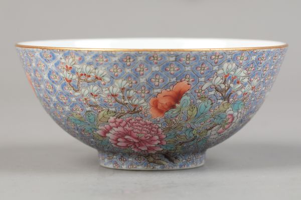 A CHINESE PORCELAIN FAMILLE ROSE LAVENDER GROUND BOWL
