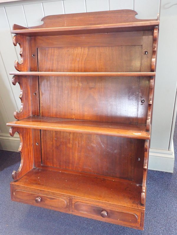 A 19th CENTURY MAHOGANY HANGING WATERFALL BOOKCASE