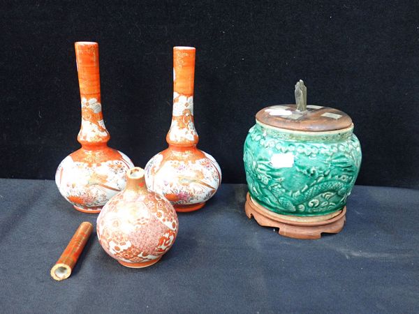 A CHINESE GREEN GLAZED JAR WITH  CARVED WOOD COVER AND STAND